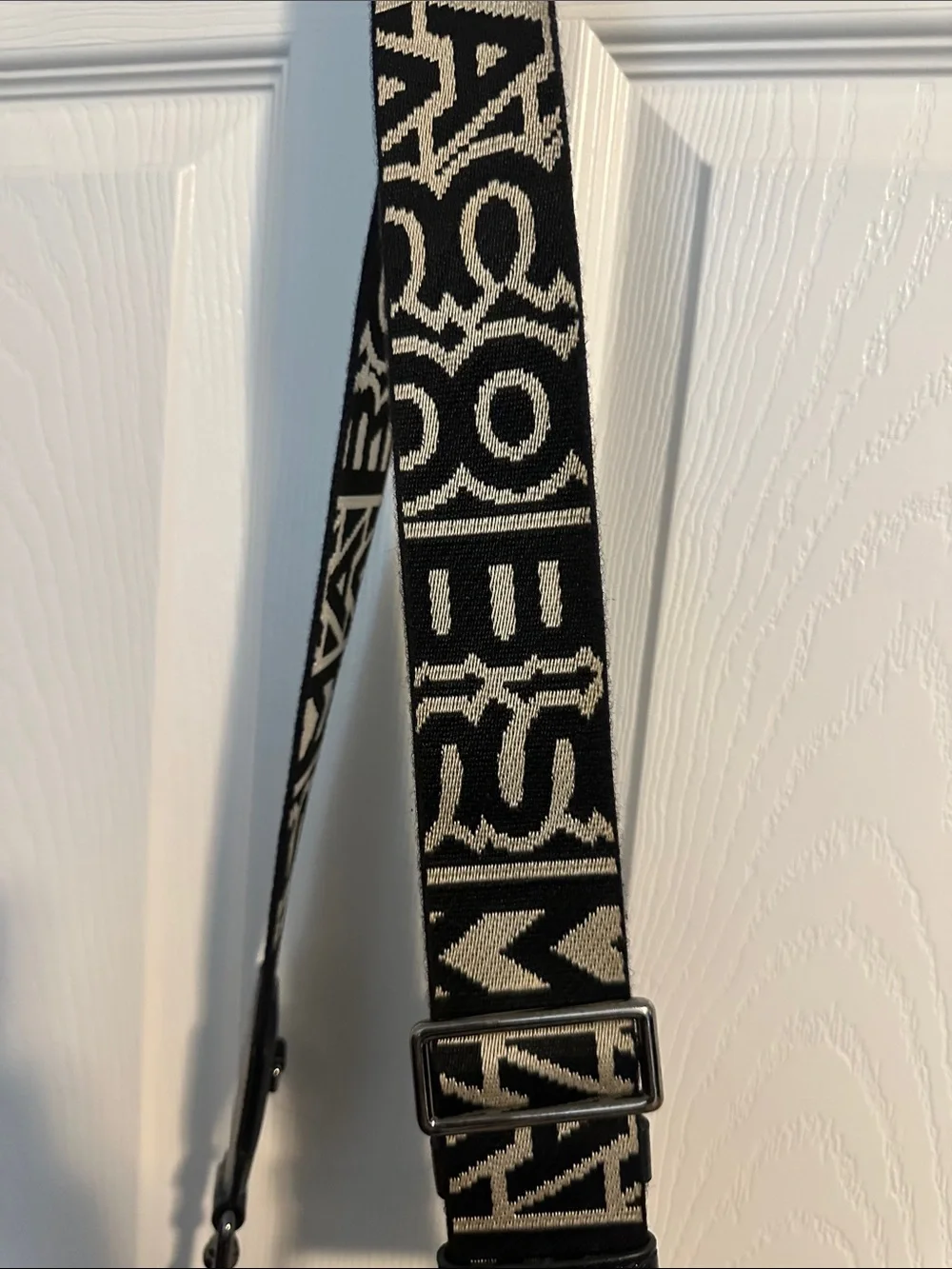 Marc Jacob’s Black and Cream Crossbody Camera Bag with Branded Strap